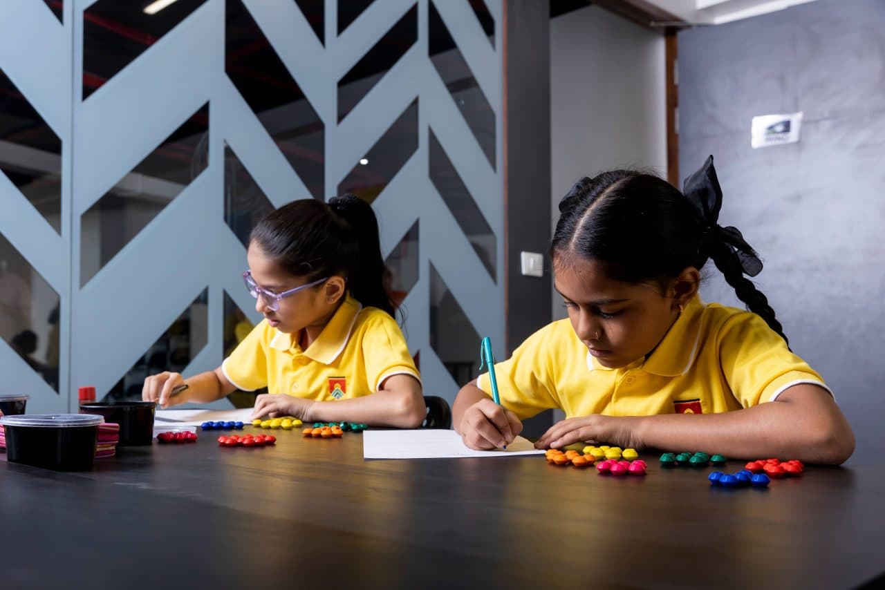 Shikha Academy students working on a classroom activity